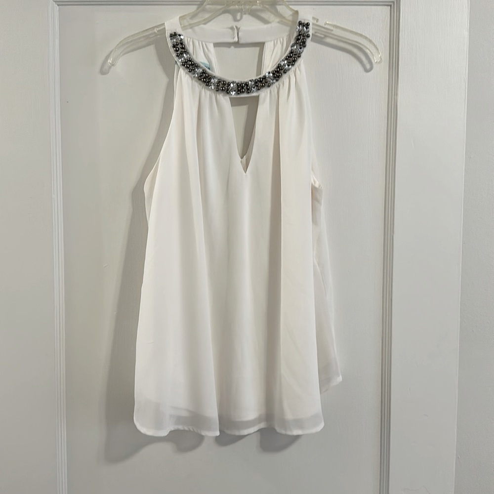 White flowy top with beaded detail